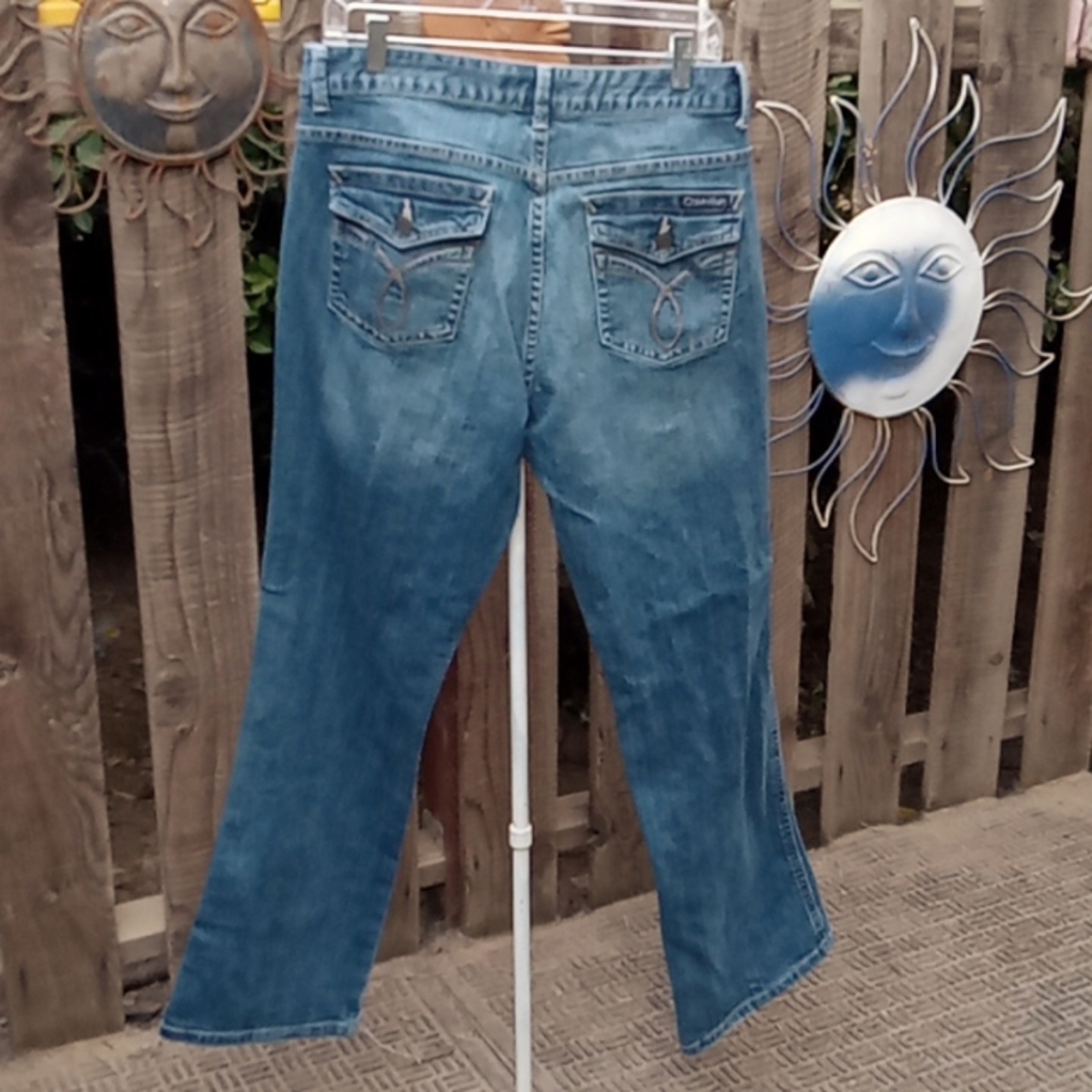 Woman's jeans blue good stretch size 14 Calvin Klein. Lean boot.